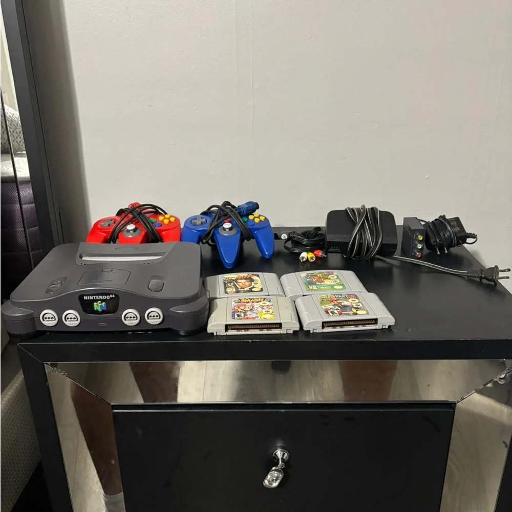Nintendo Gray Console with Controllers and Game Cartridges